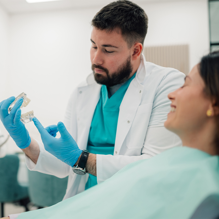 general dentist with the happy patient